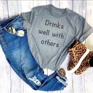 Drinks well with others Tshirt.